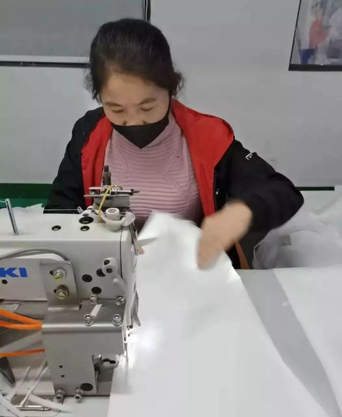 26名车缝工返厂助邻，全力支援防护服生产